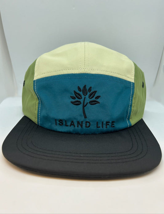 nylon waterproof running hat in blue, yellow and green with black logo embroidery on the front by island life apparel.