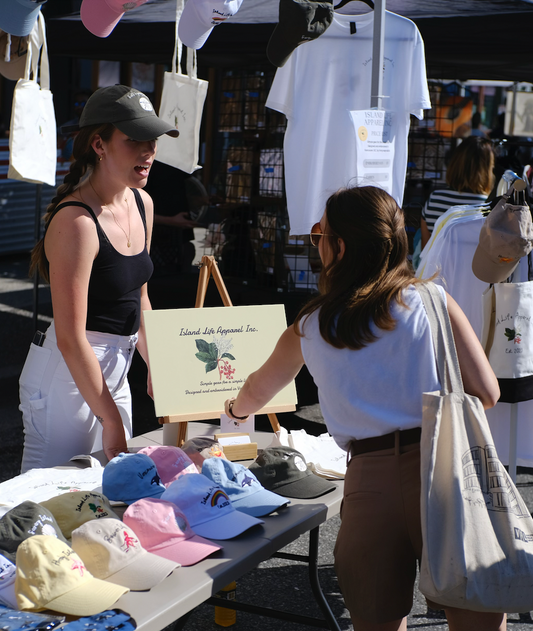 Community, Charity, and Chill Vibes - The foundation of our locally embroidered dad hats, simple socks, classic t-shirts and sturdy totes.