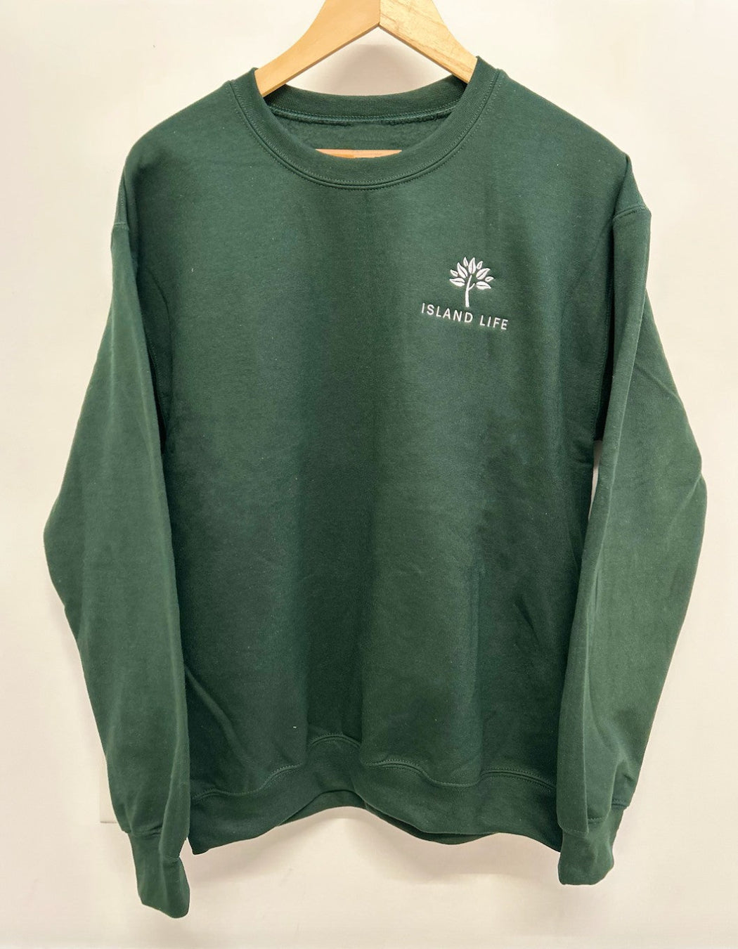 'Forest Green' Embroidered Crewneck Sweatshirt – 'Forest Green' embroidered crewneck sweatshirt, offering a comfortable fit for every island lifestyle.