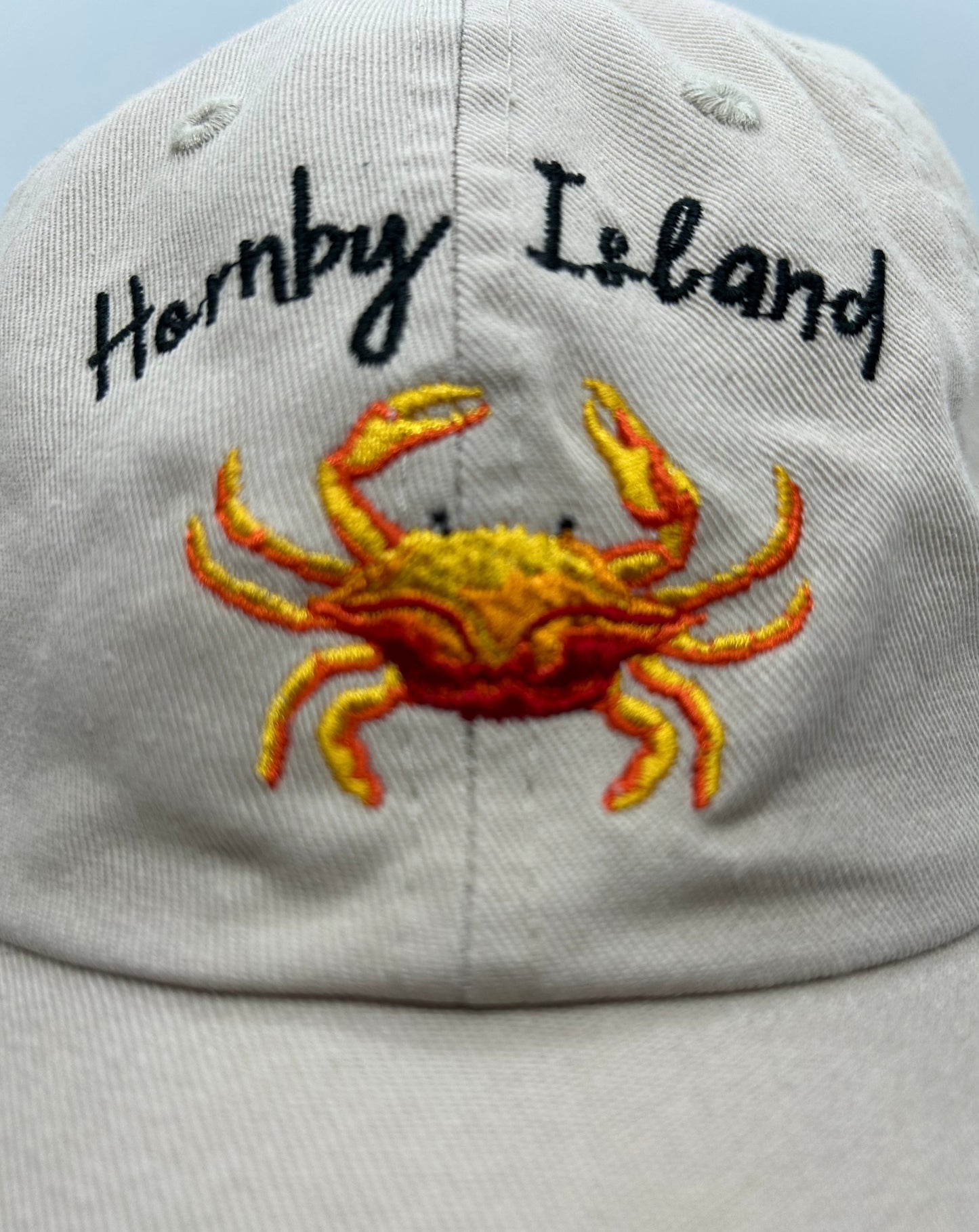 'Khaki Crab' Dad Hat – 'Khaki Crab' dad hat, embroidered with a fun crab design, ideal for sunny days on the coast. Featuring Hornby Island. 