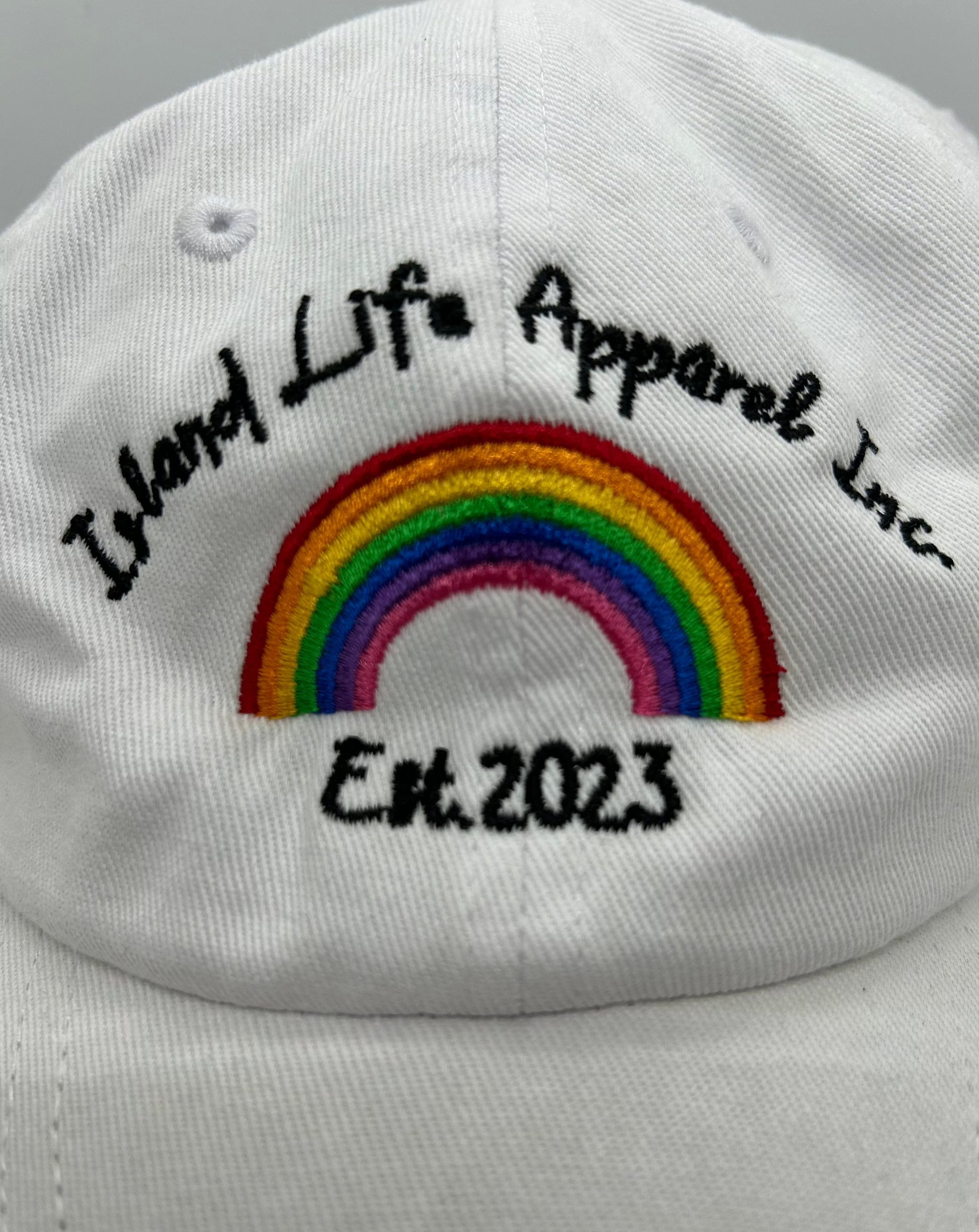 'Rainbow' Dad Hat – Vibrant 'Rainbow' dad hat, perfect for brightening up your island wardrobe with bold colours.